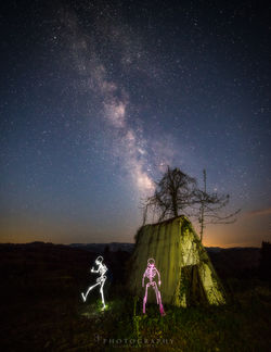 Light painting under milky way