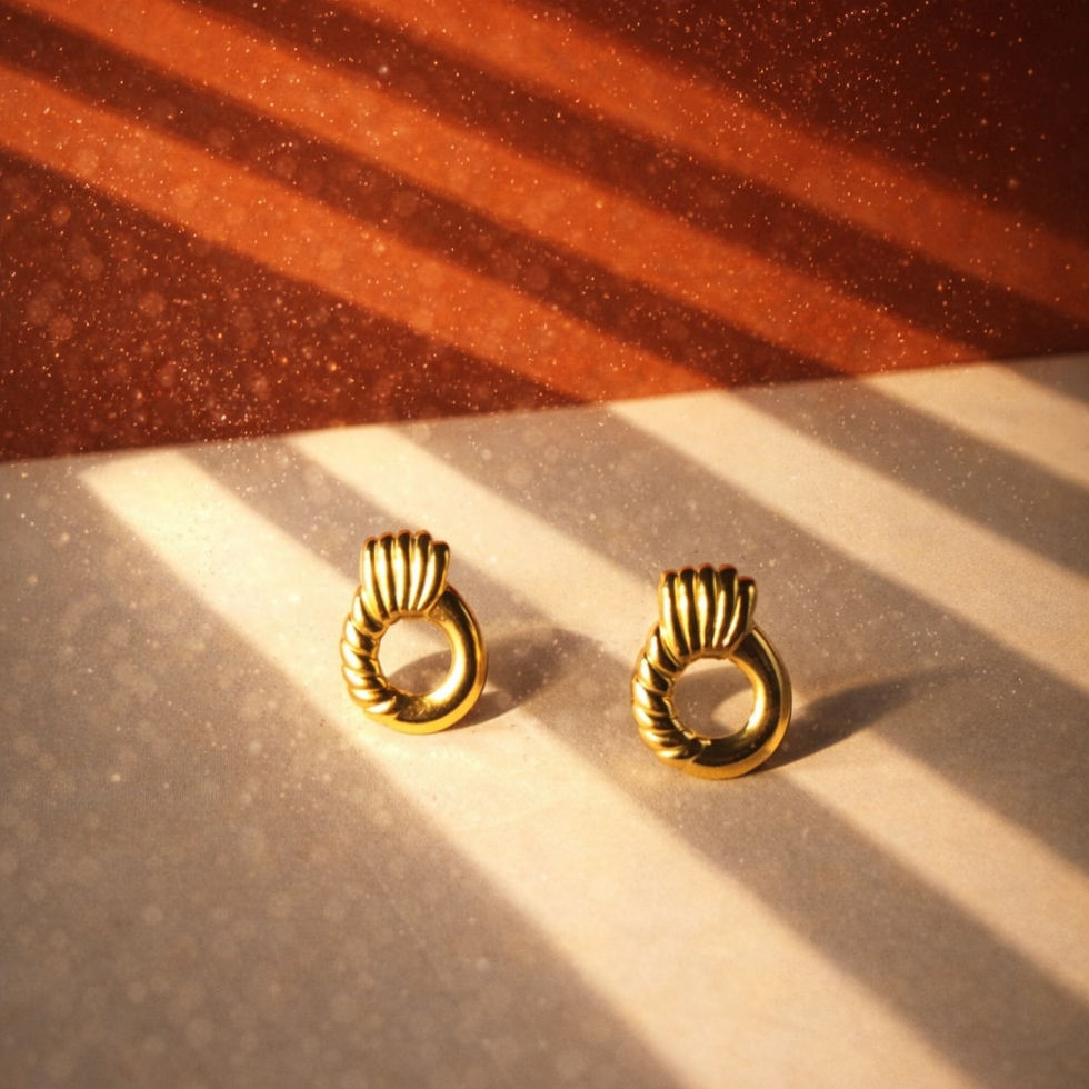 twisted hoop stainless steel anti tarnish earrings for women India gold tone studio close up