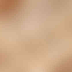 close up commercial photography of diamond style black beads gold plated mangalsutra necklace on beige fabric