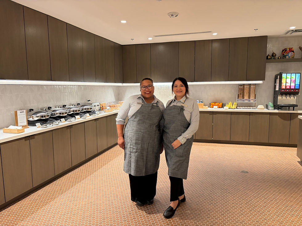 Greeted by friendly staff at the complimentary breakfast.