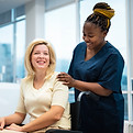 side-view-smiley-nurse-patient.jpg