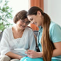 women-looking-tablet-medium-shot (1).jpg