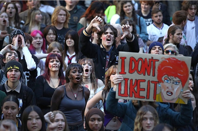 crowd of students protesting one nation
