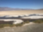 The sun bakes the salt flats of Badwater Basin in Death Valley National Park, California