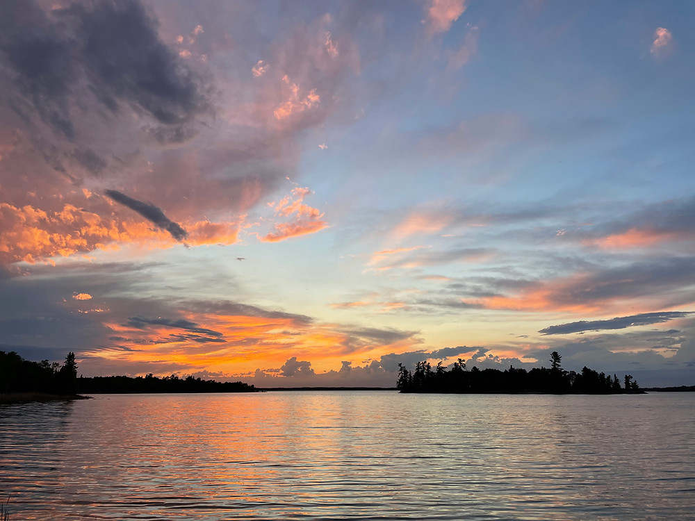 A glorious sunset over a vast lake in Voyageurs National Park, Minnesota