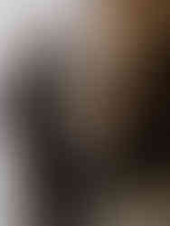 Groomsman preparing for photos at a luxury wedding photo booth in New Orleans.