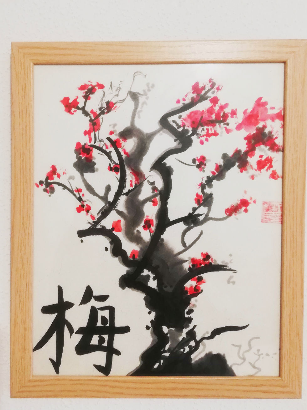 Calligraphie et peinture chinoise d'un prunier en fleurs.
