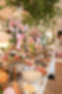 Buffet table with pink wedding and event florals.