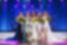 Pageant winners with wedding and event florals bouquets.
