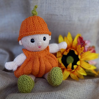 Betsy and Ben dolls pumpkin costume knitting pattern.