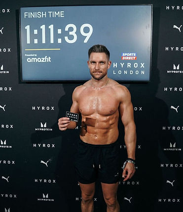 Scott celebrating his Hyrox challenge in a PB time