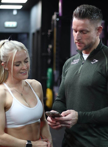 Scott showing his client the online transformation app and hose to use it