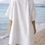 Thumbnail: White cotton towel poncho kaftan with embroidered fish motif and saya collar detail in blue