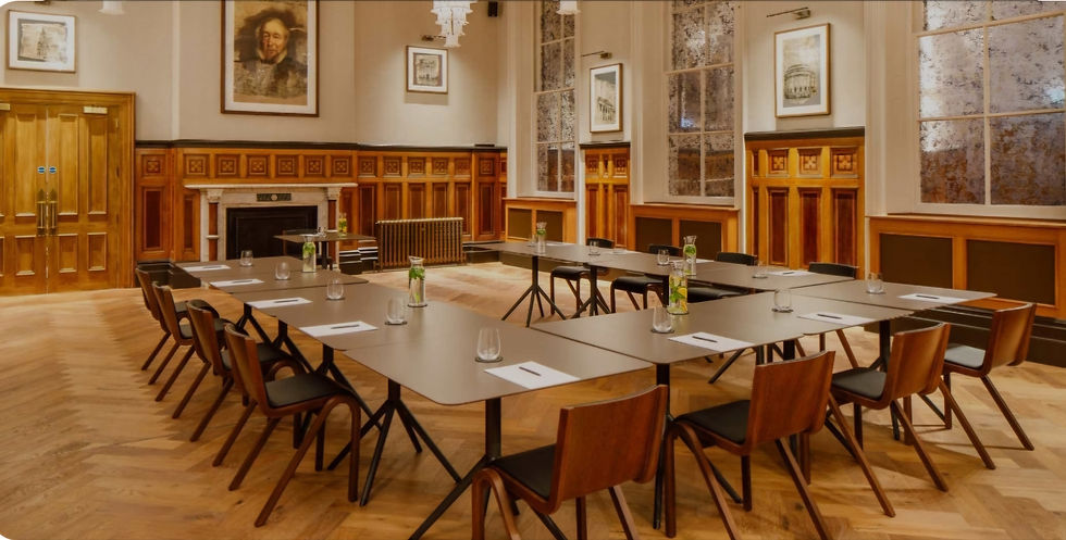 A wood panelled meeting room at the Municipal Hotel Liverpool, set up for a u-shaped meeting for 12 people.