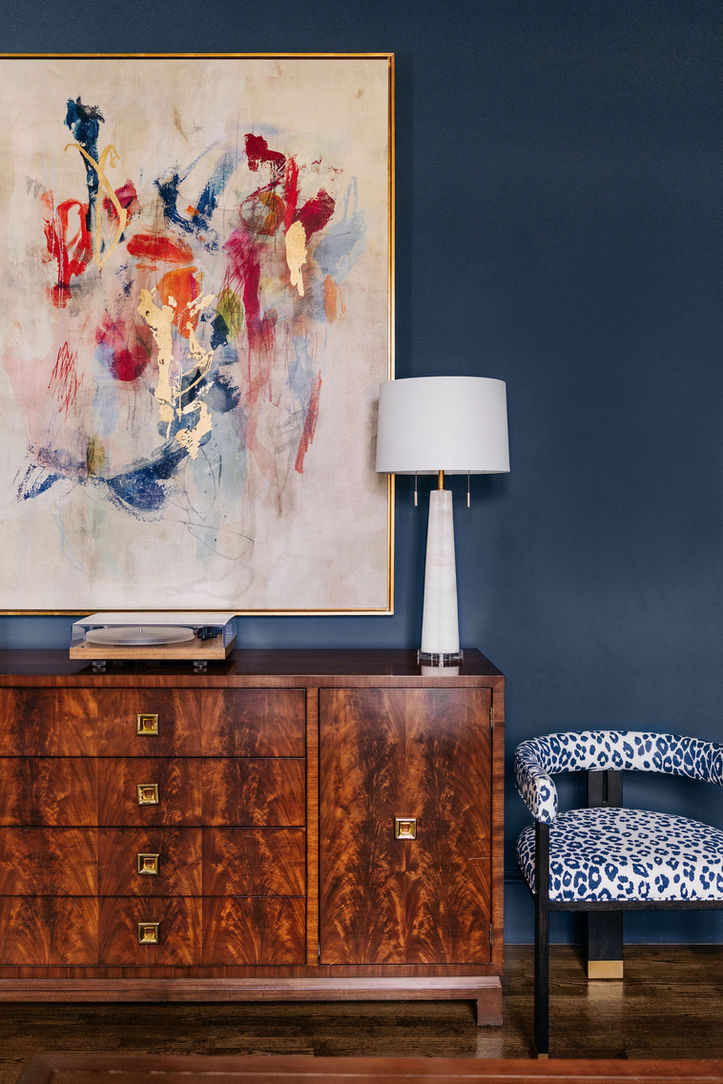 Luxury foyer styling by Fowler Interiors in Greenville, SC featuring custom furnishings and original artwork