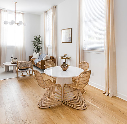 Bright living and dining space inside a 360 King suite