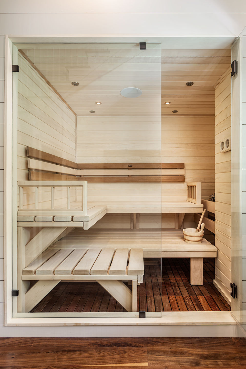 Private sauna with built-in cedar benches and natural wood finishes | Wellness and retreat features for luxury mountain homes in Cashiers and Lake Keowee