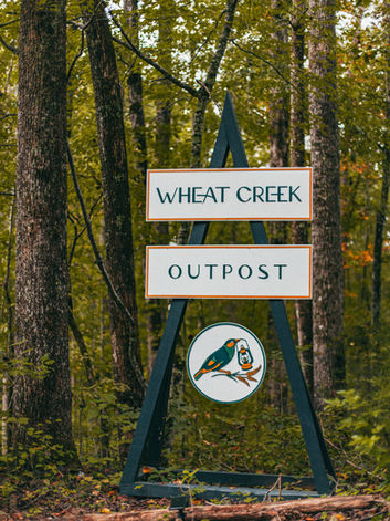 Tent-camping meets luxury at Wheat Creek Outpost – glamping pond view North Carolina