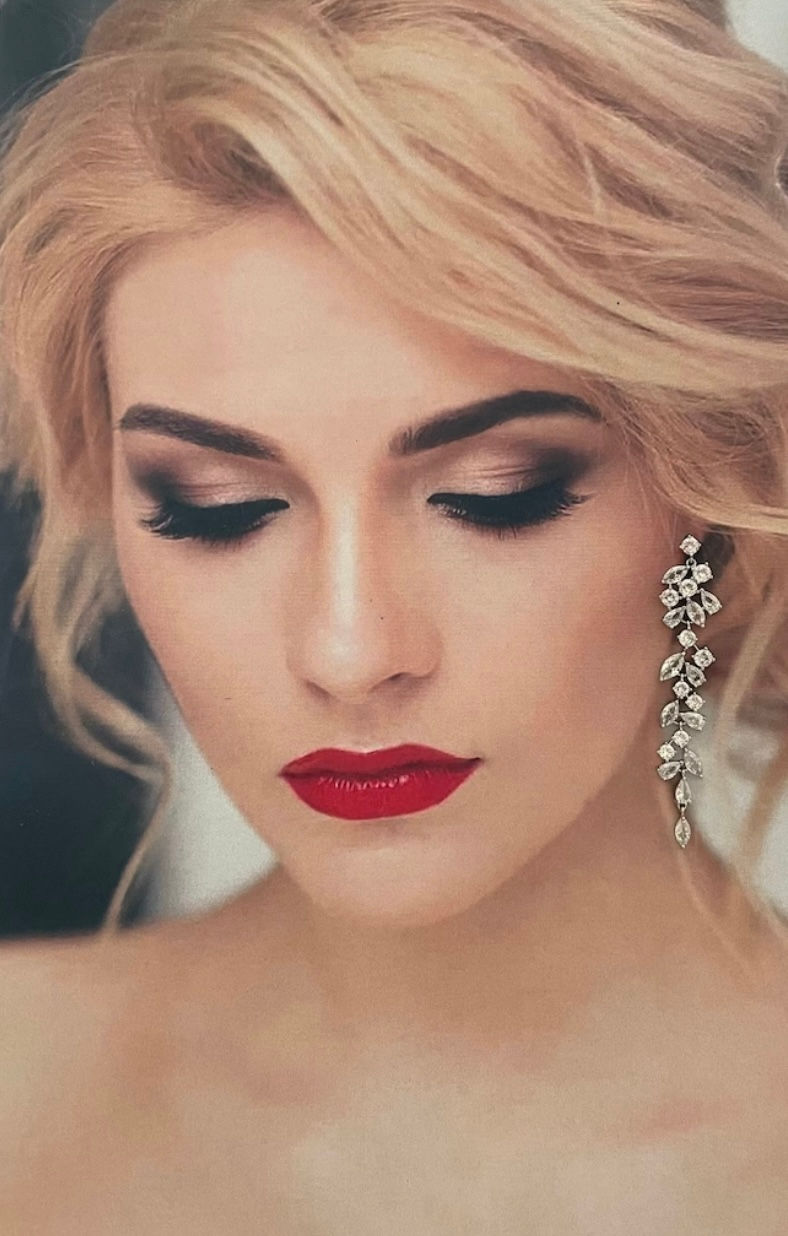 Bride with elegant makeup and sparkling earring