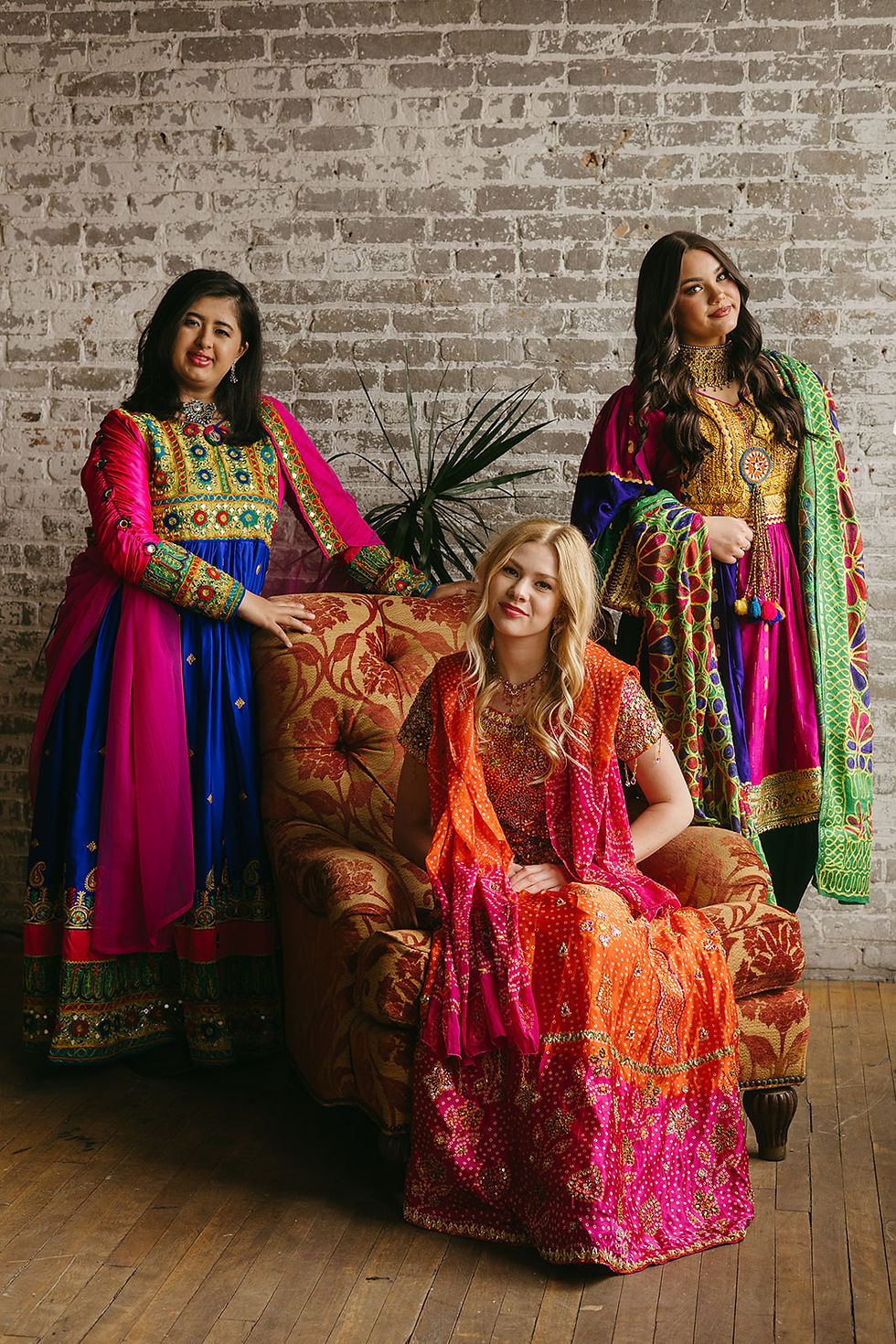 three women with saree and dupatta styling