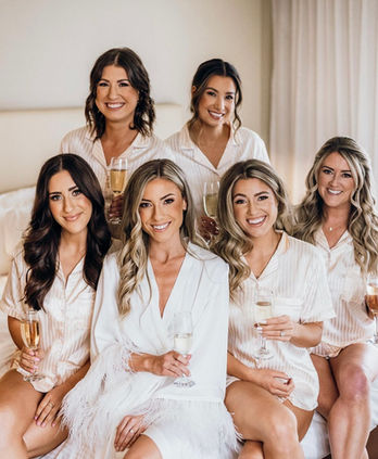 bridal party done up before the dresses go one