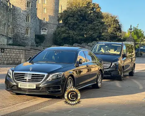 Mercedes S-Class and V-Class travelling together, keeping a group in one coordinated booking instead of separate cars.