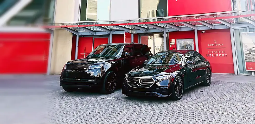 Luxury chauffeur vehicles parked at Edmiston London Heliport entrance in Battersea, ready for VIP transfers