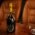 Crownwood Charters special request service featuring complimentary champagne for luxury airport transfers and chauffeur journeys.