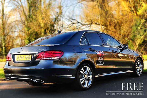 Executive car with Dinez Taxis and Airport Transfer Logo and taxi number 01252 265363