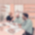 AI Cartoon-like image in pastel colours of three men sitting at the table discussing about a plant of a building represented in a piece of paper in front of them