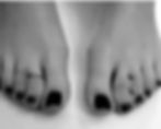 Toes with black polish, toe ring, and piercings