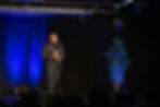 BLACK JACKET SMILING ON STAGE - EXCELLENT.jpg