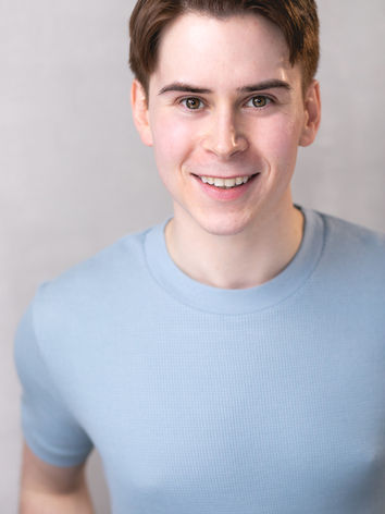Kyle Fleig Headshot (Light Blue).jpg