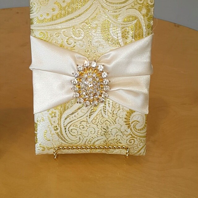 Oh the beauty! Take a look at this beautiful padded fabric box invitation we created and constructed