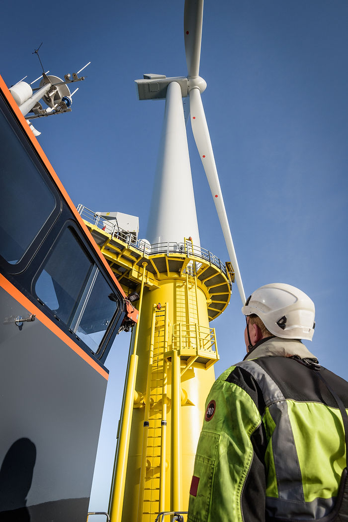 engineers-climbing-wind-turbine-from-boat-at-offsh-2026-03-10-02-11-59-utc.jpeg