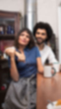 Wix image of a man and woman sittle close together