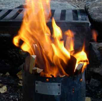 THREE GREAT WOOD BURNING TRAIL STOVES