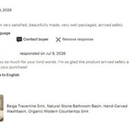 Screenshot of a 5-star customer review and seller response for Denmer beige travertine sink.