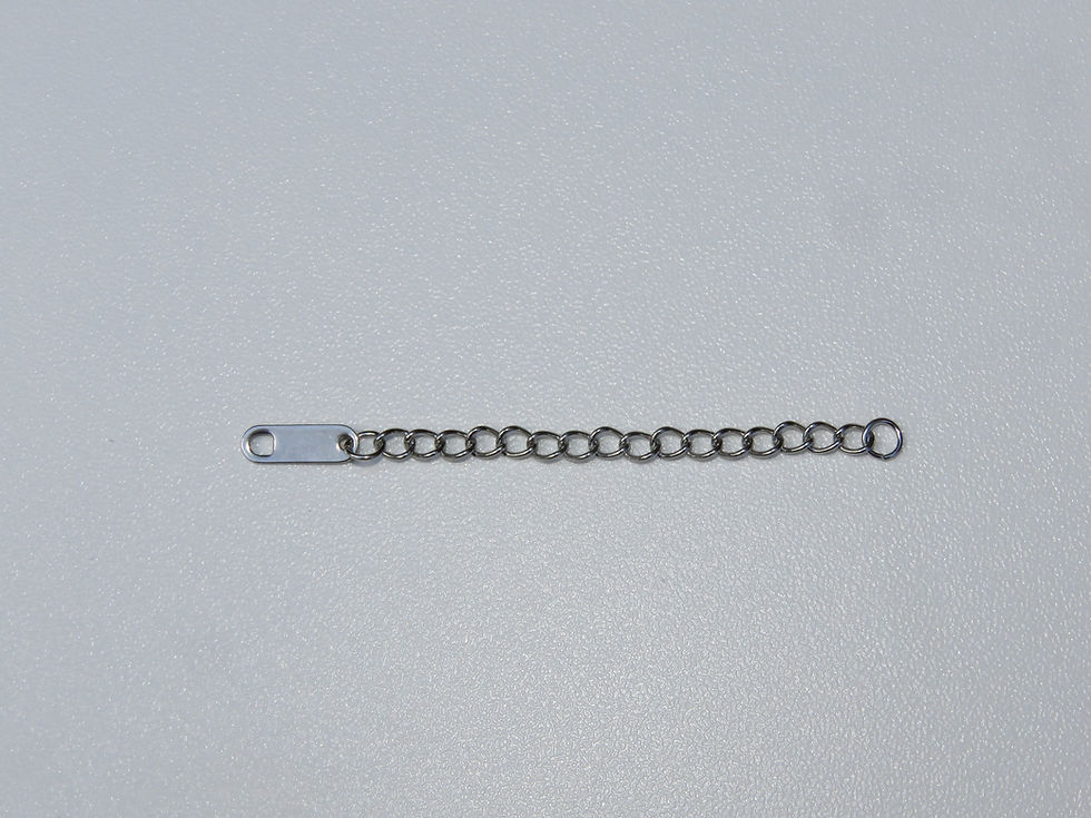 Silver extender for necklaces on white back ground