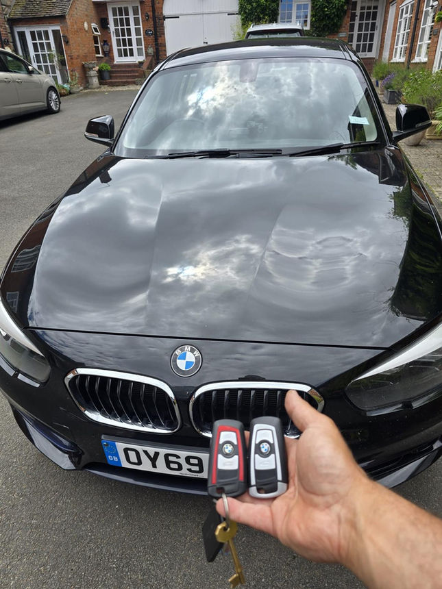 Auto locksmith programming new key for 2019 BMW 1 Series after original key malfunctioned. 
