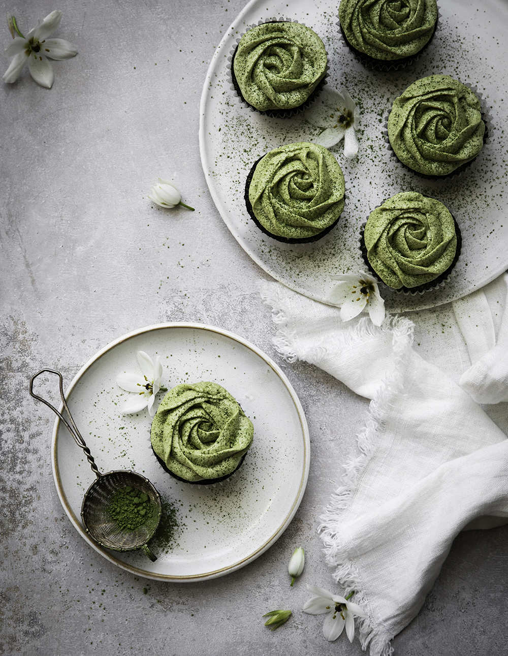 Chocolate cupcakes with matcha green tea frosting