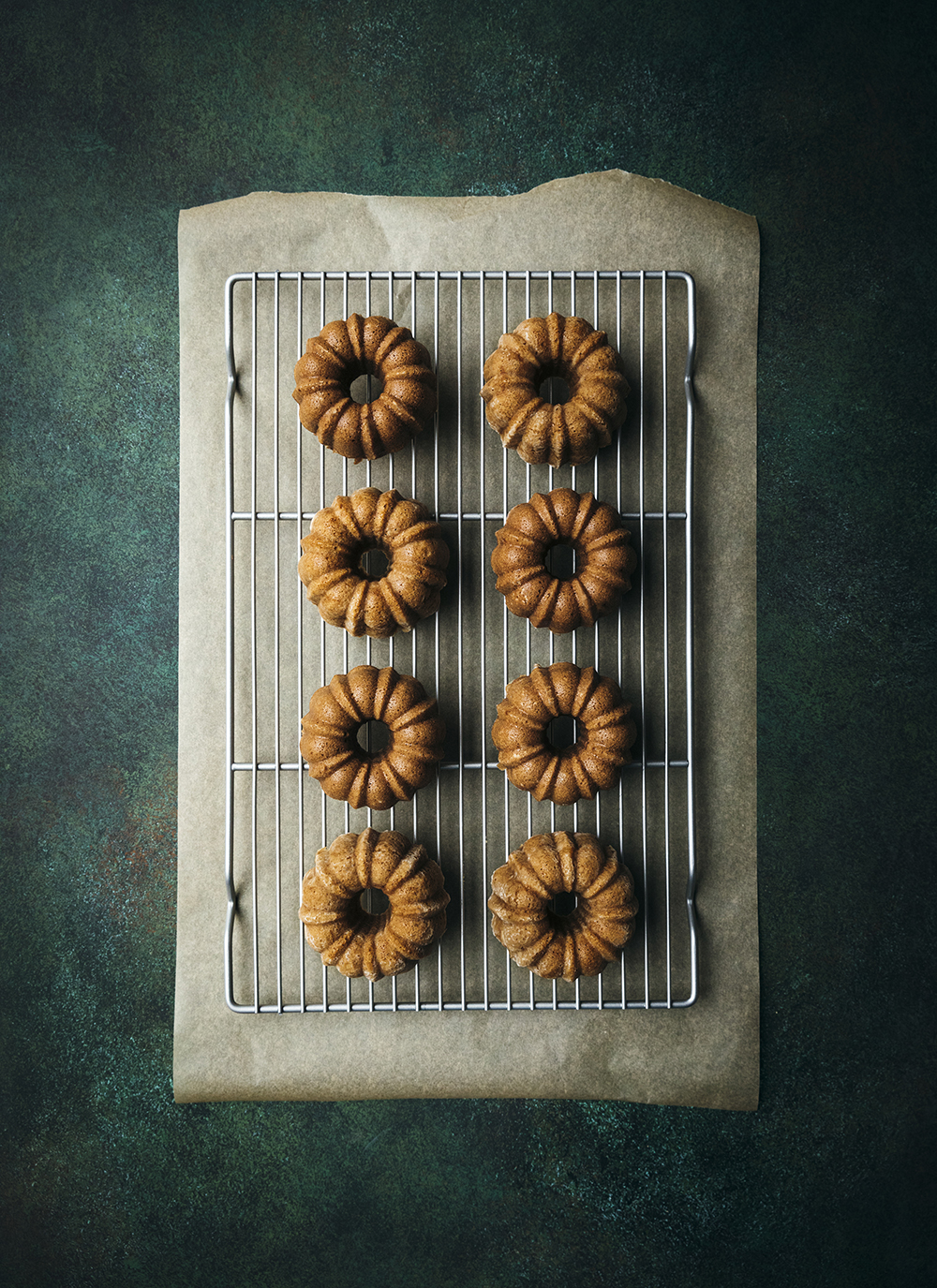 Mini bundt cakes on cooling rack