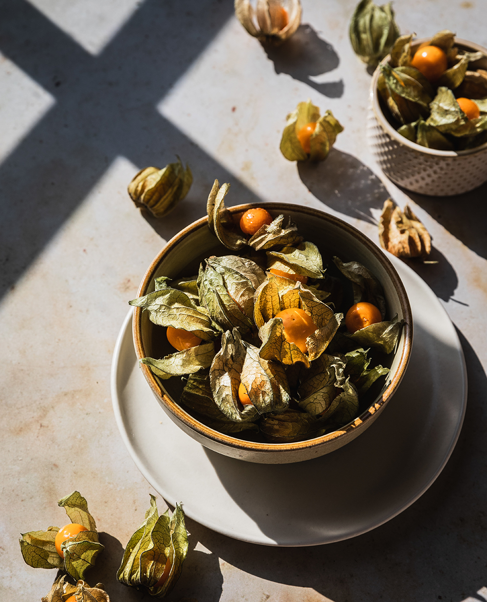 Bowl of golden berries on a table
