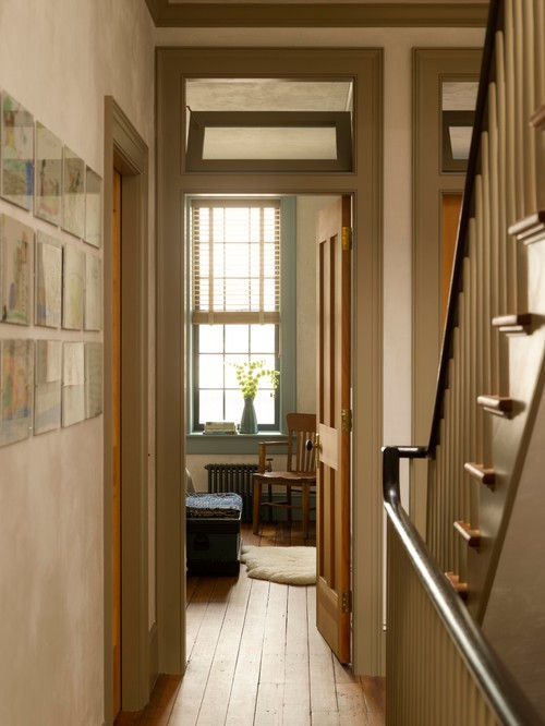 Tall doors, as opposed to lower passageways, are an incredible way to enhance the height of any space. If you don’t want to break the bank, try incorporating transoms above the door. They can serve the purpose of adding a sense of height along with allowing more light in your space to make it appear more spacious.