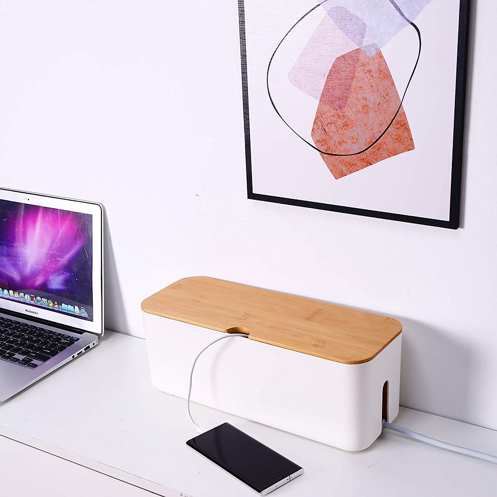 Cluttered desks can contribute to lack of focus and loss in productivity (unless, of course, you're the type of person that thrives in clutter!). Therefore, an ergonomic home office should ideally be organised and free of mess. Begin by removing knickknacks and other items you don’t need. Tuck away essentials in nearby cabinets and get rid of items that are no longer in a working condition, such as a worn-out fax machine. The aim is to keep flat surfaces as clear as possible. Consider purchasing items for organisation, such as: Cable organisers: There are sure to be plenty of cables under your desk, and tidying them up is essential for a clutter-free space. One option is a cable box that grabs all trailing cables and keeps the space free of tangled wires.