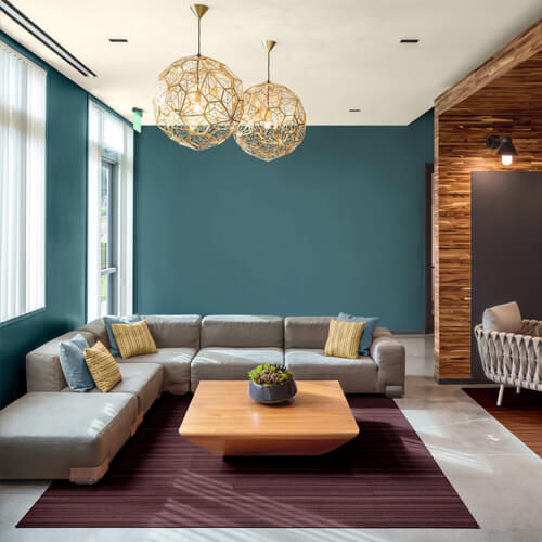 This is a beautiful combination between blue-green teal and woodsy forest green, with a turquoise undertone. The dark and muted tonality encompasses the idea of bringing the outdoors indoors. It communicates feelings of tranquility whilst creating a calming ambience. Vining Ivy is a classic, traditional, and elegant hue that works well with various decorating styles, such as warm metal and deeper-toned wood finishes. This shade makes a bold and soothing statement when used on full wall settings paired with white and crisp trims. Vining Ivy is a flexible colour that can be used for a broad range of products, including office furniture, consumer electronics, and kitchenware. It's also an attractive colour for front doors, sitting rooms, and even bedrooms.