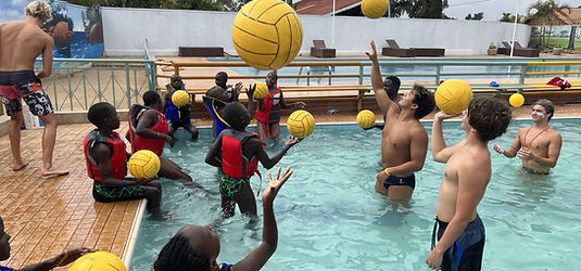 Ian-Roman-and-Max-teaching-ball-handeling.jpg