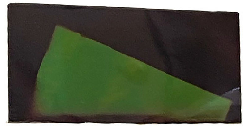 2021 Mono C-Print 2x1 inches ALT TEXT
A color pinhole image shown upside-down, depicting a green triangular shape