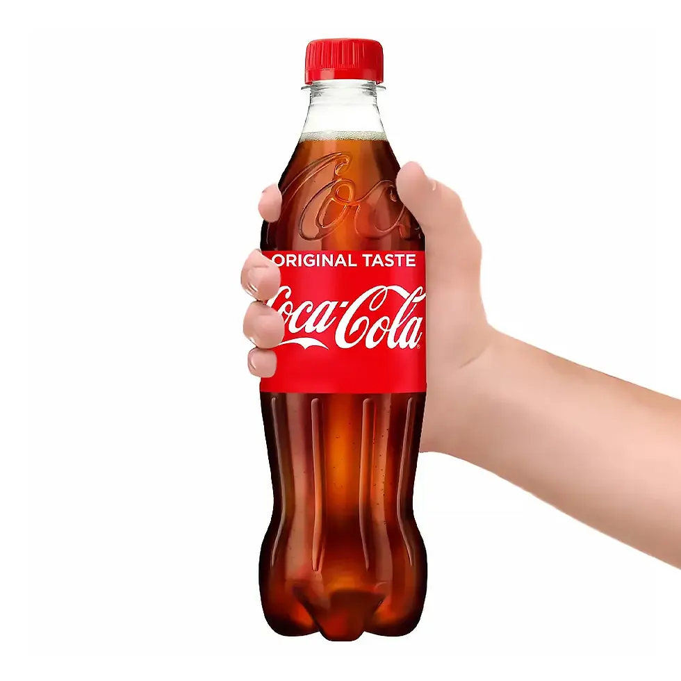 A Person Holding a Coca-Cola Original Taste x 500ml Bottle