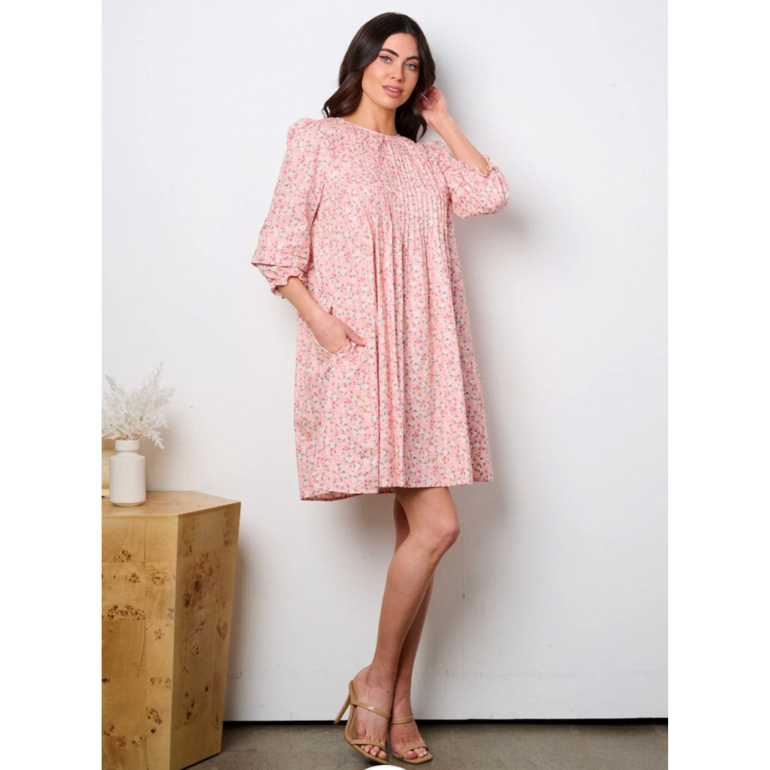 A woman wearing a vavitho 3/4 sleeves cotton tunic dress